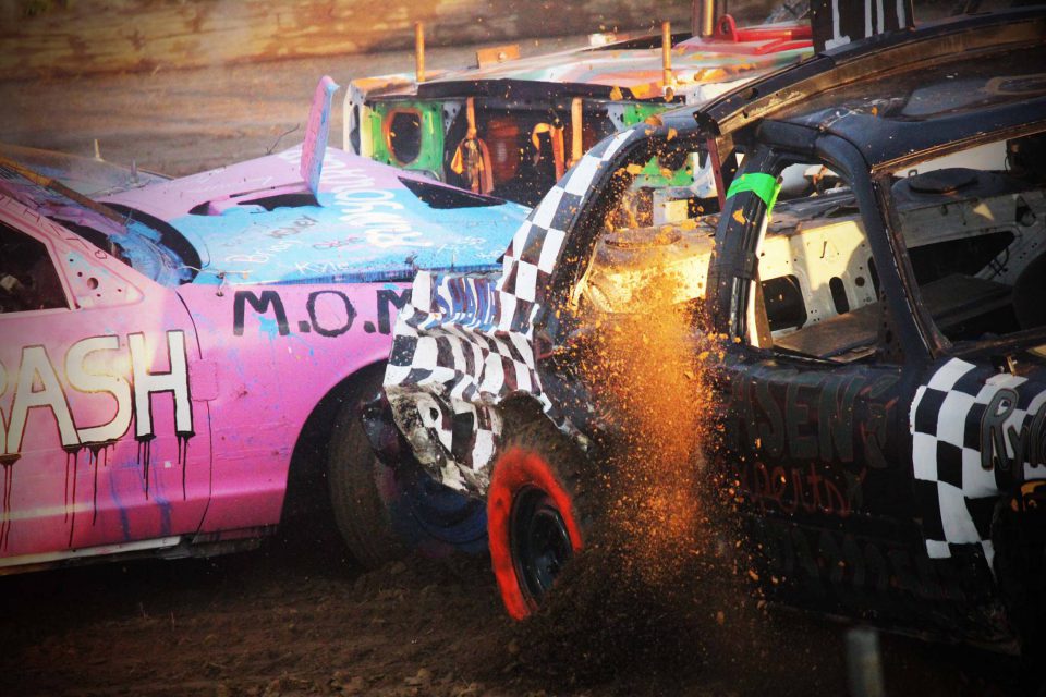 Demolition derby cars crashing into one another